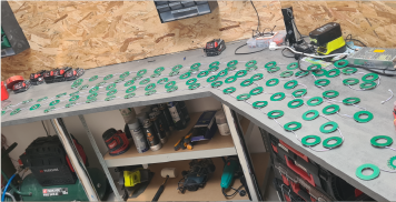 a table with many green objects on it